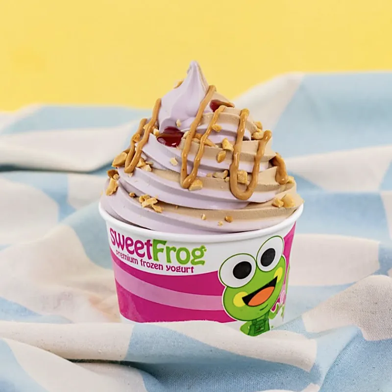 A sweetFrog frozen yogurt swirl with peanut butter drizzle